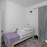 Tomasi One Konukevi